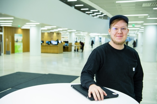 Me smiling in Helsinki University library